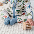 Close up on baby wearing the Grow Grows Organic Dandy Dinos Sleepsuit | Baby Grows and Onesies | Organic Baby Clothing - Clair de Lune UK