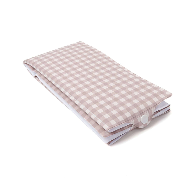 Folded Gingham Foldable Travel Changing Mat with close-up of the snap fastening on white background | Bathing & Changing Essentials - Clair de Lune UK