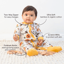 Baby sat wearing the Grow Grows Honey Bees Organic Sleepsuit with key features | Baby Grows and Onesies | Organic Baby Clothing - Clair de Lune UK