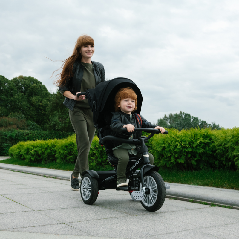Mum running while pushing her Onyx Black Bentley 6in1 Trike - Convertible Baby Stroller | Strollers, Pushchairs & Prams | Pushchairs, Carrycots & Car Seats Baby | Travel Essentials - Clair de Lune UK