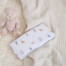 Jungle Dream Folding Travel Changing Mat view from above laid out plush blankets and muslins with rattle and baby toys | Baby Change Mats | Baby Bath Time Essentials - Clair de Lune UK