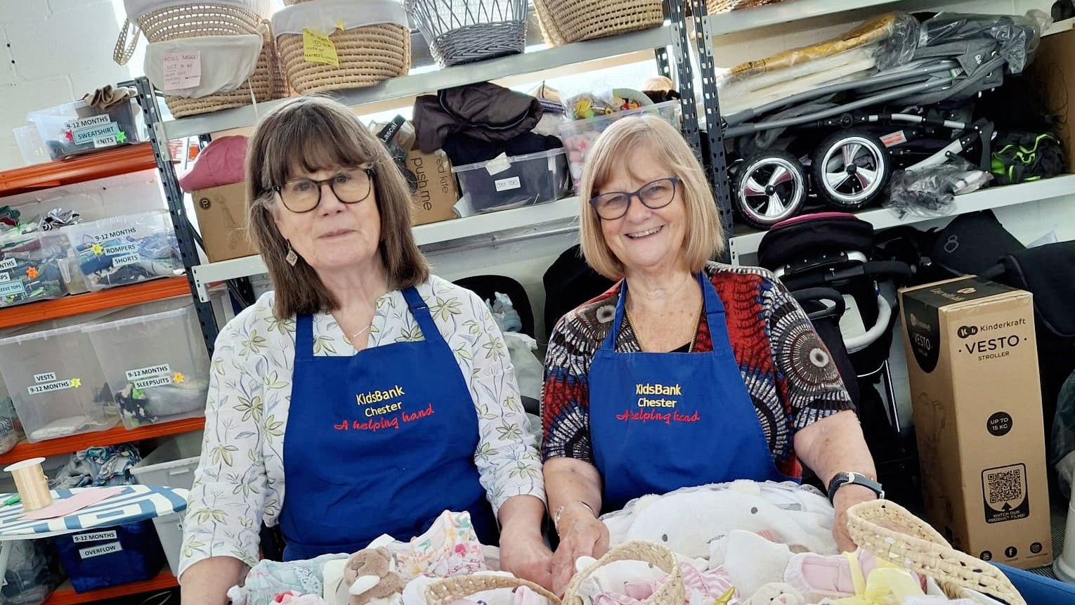 Volunteers at the KidsBank chester with donations of Moses baskets filled with newborn baby essentials | Charity Partnerships - Clair de Lune UK