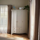 Cashmere CuddleCo Clara Luxe 3 Piece Furniture Set in a cosy, warm nursery, focus on the 3 door wardrobe | Cot Bed, Wardrobe, Changer | Nursery Furniture - Clair de Lune UK