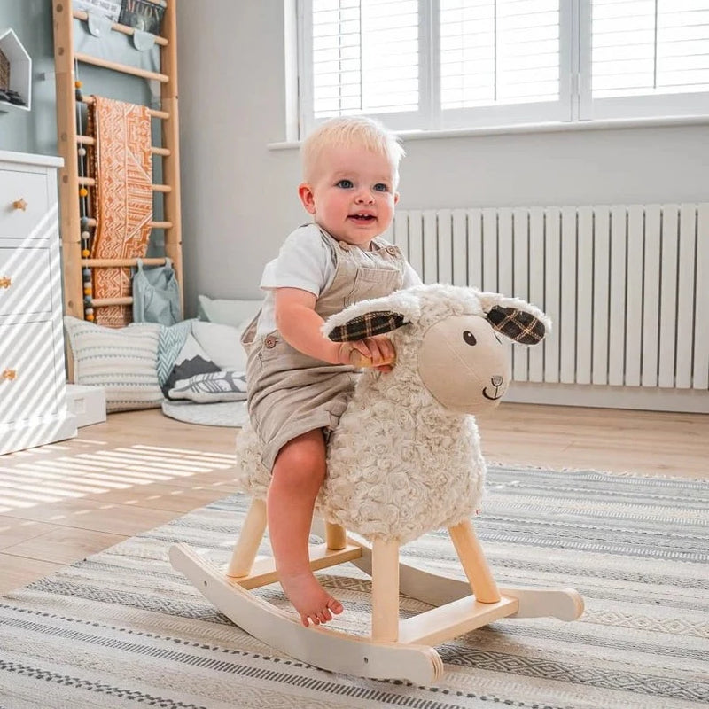 Toddler girl enjoying her imaginary adventure with her Little Bird Told Me Lambert Rocking Sheep | Rocking Animals | Montessori Activities For Babies & Kids | Toys | Baby Shower, Birthday & Christmas - Clair de Lune UK