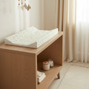 Leaf Anti-Roll Wedge Baby Changing Mat on an Oak Changing Unit in a neutral beige nursery  | Baby Bath Time Essentials - Clair de Lune UK