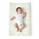 Baby lying on the Leaf Anti-Roll Wedge Baby Changing Mat | Baby Bath Time Essentials - Clair de Lune UK
