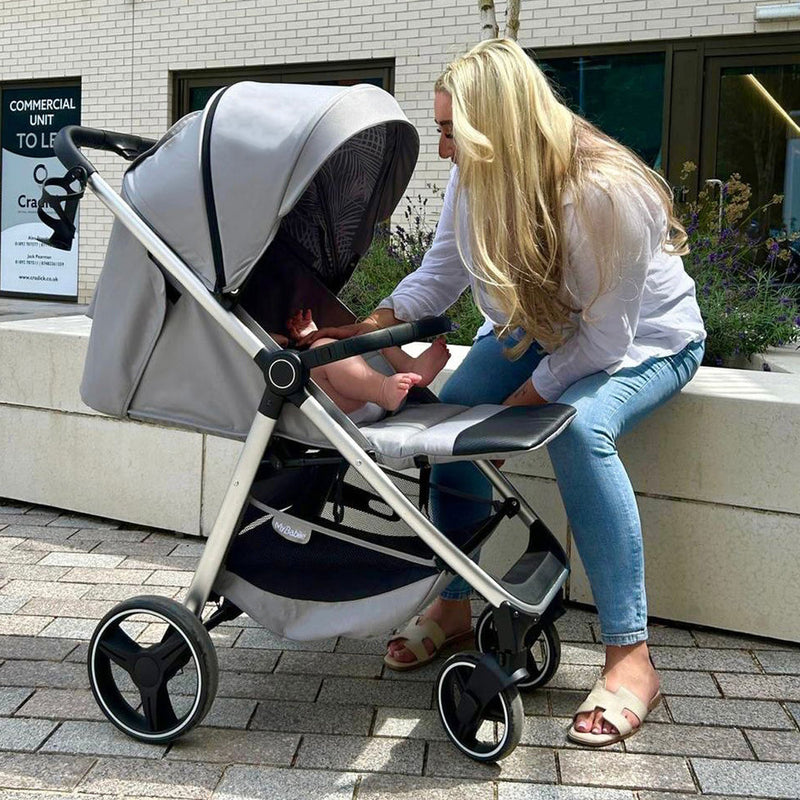 Mom next her baby in My Babiie MB160 Samantha Faiers Grey Tropical Pushchair | Buggies, Strollers & Pushchairs | Travel With Your Baby - Clair de Lune UK