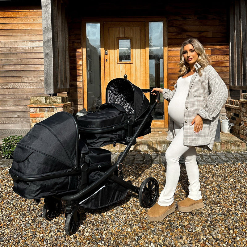  Dani Dyer next to her babies in My Babiie MB33 Dani Dyer Black Leopard Tandem Pushchair in front of her house | Buggies, Strollers & Pushchairs | Travel With Your Baby - Clair de Lune UK