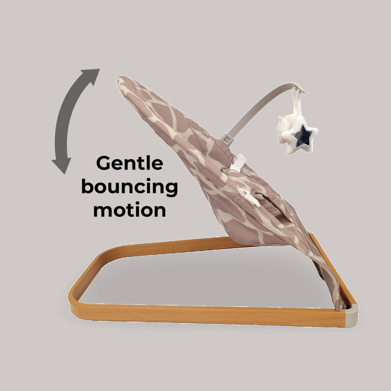 The gentle bouncing motion of the My Babiie Dani Dyer Giraffe Baby Bouncer | Baby Swings, Rockers & Baby Bouncers | Toys - Clair de Lune