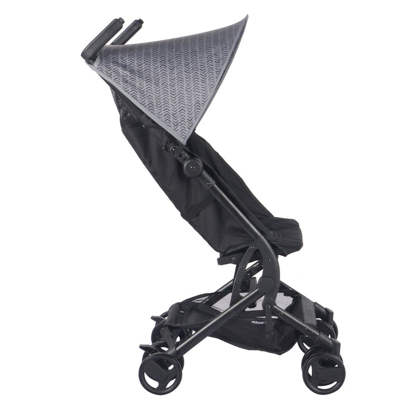 The side of Dani Dayer pusing her baby in My Babiie MBX5 Ultra Compact & Aeroplane Carry-on Approved Black Chevron Stroller | Buggies, Strollers & Pushchairs | Travel With Your Baby - Clair de Lune UK