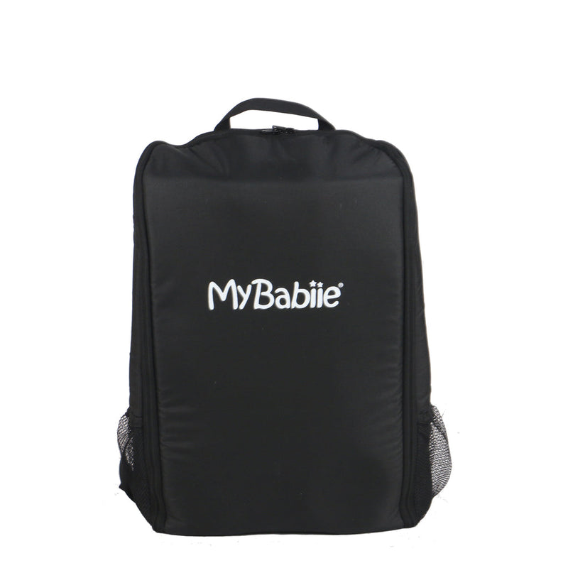 Folded Dani Dayer pusing her baby in My Babiie MBX5 Ultra Compact & Aeroplane Carry-on Approved Black Chevron Stroller in the My Babiie Travel Bag | Buggies, Strollers & Pushchairs | Travel With Your Baby - Clair de Lune UK