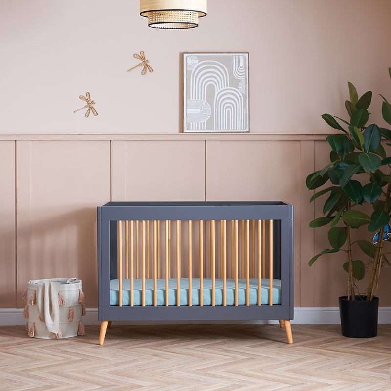 The Scandi Slate Obaby Award-Winning Maya Mini Cot Bed in a coral nursery room | Cots, Cot Beds, Toddler & Kid Beds | Nursery Furniture - Clair de Lune UK