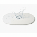 Splash on the Moses Basket Mattress Protector to Show that it's water resistant | Soft Baby Sheets | Moses Basket Bedding - Clair de Lune UK