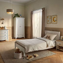 White/Ash CuddleCo Clara Luxe 3 Piece Furniture Set the Clara Cot Bed converted to a toddler bed in a cosy and stylish nursery | Cot Bed, Wardrobe, Changer | Nursery Furniture - Clair de Lune UK