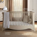 Cashmere CuddleCo Clara Luxe 3 Piece Furniture Set, close up of the Cot Bed with key features of 3 mattress base positions, and converts to toddler bed | Cot Bed, Wardrobe, Changer | Nursery Furniture - Clair de Lune UK
