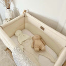 Organic Folding Crib Fitted Sheets in the Folding Travel Cot in a white modern nursery | Bedside & Folding Crib Accessories | Soft Baby Sheets | Nursery Linen - Clair de Lune UK