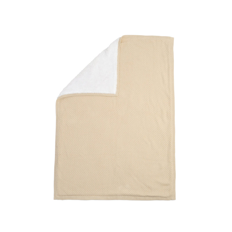 Flat lay of the Organic Knit Sherpa Blanket in Cream with the corner folded over to see the cosy plush fleece | Cosy Baby Blankets | Swaddles | Baby Winter Warmers - Clair de Lune UK