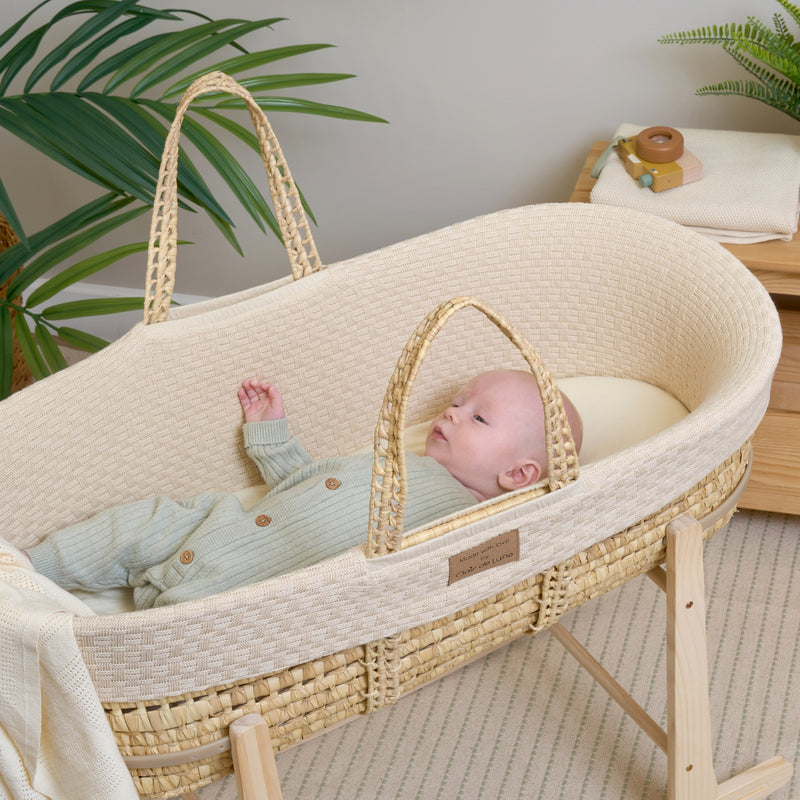 newborn baby sleeping in the Cream Organic Knitted Palm Moses Basket | Moses Baby Baskets, Bassinets | Organic Baby Essentials | Nursery Furniture - Clair de Lune UK