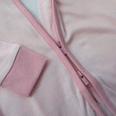 Close up on the double zip of the pink Grow Grows Organic Pinstripe Sleepsuit on white background  | Baby Grows and Onesies | Organic Baby Clothes - Clair de Lune UK