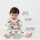 Baby wearing the Grow Grows Organic Playful Pandas Sleepsuit with key features | Baby Grows and Onesies | Organic Baby Clothes - Clair de Lune UK
