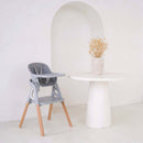 Grey Playtime High Chair next to a dining table in an ultra stylish kitchen | Feeding & High Chairs | Nursery & Kids Furniture - Clair de Lune UK