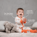  Baby sat clapping wearing the GrowGrows Organic Radiant Rainbows Sleepsuit with key features | Baby Grows and Onesies | Organic Baby Clothes - Clair de Lune UK