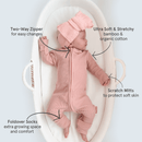 Newborn wearing the Blush Grow Grows Organic Ribbed Baby Sleepsuit with key features | Baby Sleep Wear | Children's pyjamas - Clair de Lune UK