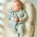 Newborn wearing the Sage Grow Grows Organic Ribbed Baby Sleepsuit and cuddling with the Elephant Organic Comforter | Baby Sleep Wear | Children's pyjamas - Clair de Lune UK