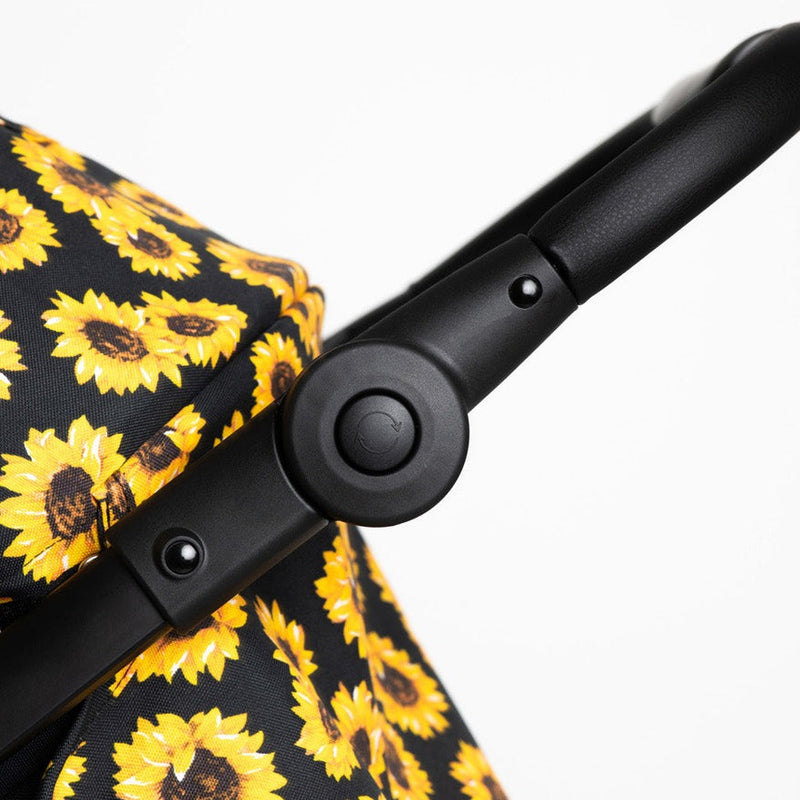 The pushchair handle of the Sunflower Roma Atlas 3 Wheel Pram | Strollers, Pushchairs & Prams | Pushchairs, Carrycots & Car Seats Baby | Travel Essentials - Clair de Lune UK