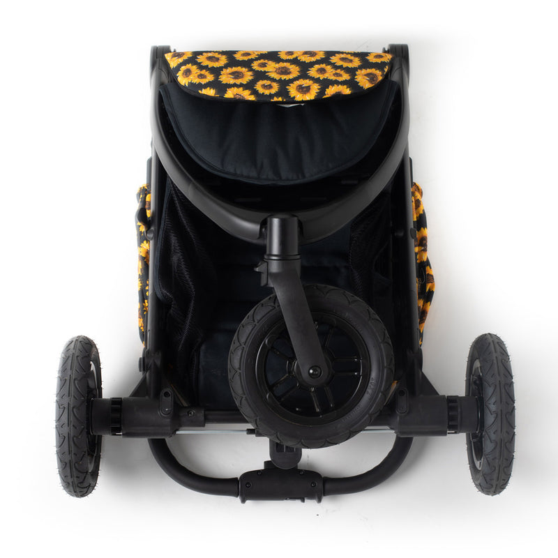 The front of the Folded Sunflower Roma Atlas 3 Wheel Pram | Strollers, Pushchairs & Prams | Pushchairs, Carrycots & Car Seats Baby | Travel Essentials - Clair de Lune UK
