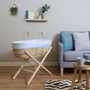 Blue Stripe Palm Moses Basket on Natural Folding Stand in Living Room | Moses Baby Baskets, Bassinets | Nursery Furniture - Clair de Lune UK