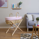 Pink Stripe Palm Moses Basket on Natural Folding Stand in living room | Moses Baby Baskets, Bassinets | Nursery Furniture - Clair de Lune UK
