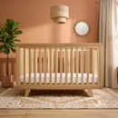 Solid Oak Cot Bed in neutral  terracotta nursery by the window | Nursery Furniture - Clair de Lune UK