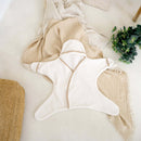 Cream Star Hooded Baby Towel laid flat on muslins by a jute rug | Bath Time Essentials | Newborn Hooded Towel - Clair de Lune