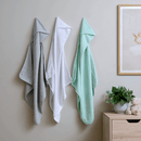 East Coast 3 Pack Cuddle Robes Hanging in the nursery showing the grey, white and aqua hooded towels | Baby Bath Time Essentials | Newborn Essentials - Clair de Lune UK
