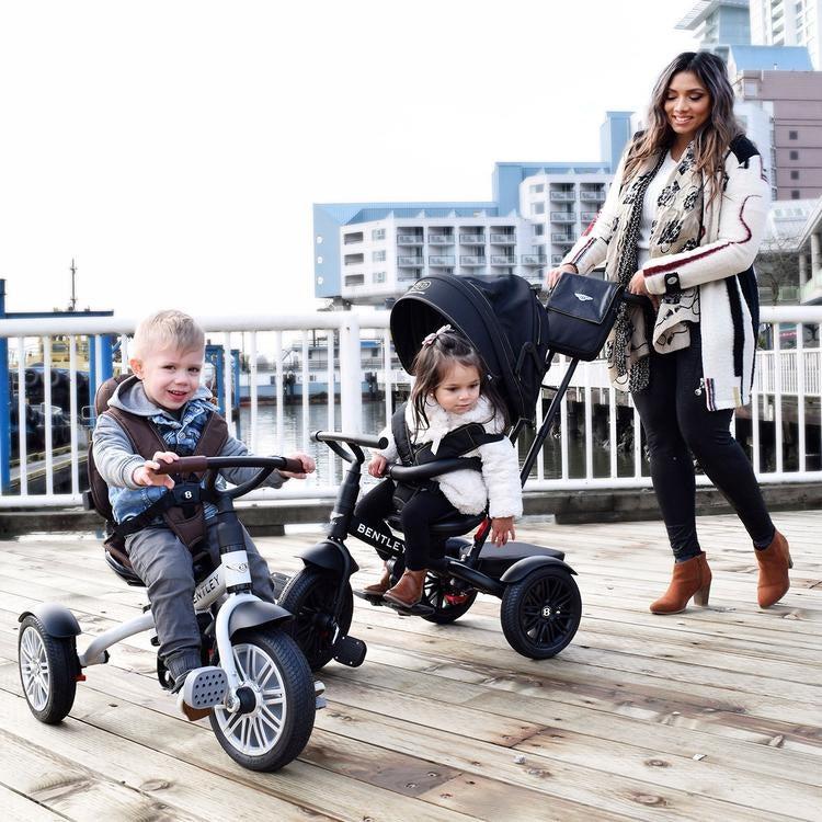 Mum pushing her Onyx Black Bentley 6in1 Trike - Convertible Baby Stroller while her another kid riding his Bentley 6in1 Trike - Convertible Baby Stroller | Strollers, Pushchairs & Prams | Pushchairs, Carrycots & Car Seats Baby | Travel Essentials - Clair 