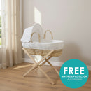 White Waffle Palm Moses Basket With Stand & Bedding Bundle by a bright window in the nursery with FREE mattress protector for a limited time only | Moses Baby Basket & Bassinet - Clair de Lune UK