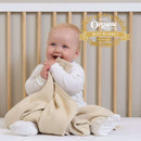 2025 Gold Award Winning Cream Organic Knitted Baby Blanket Rolled to show the gorgeous weave | Cosy Baby Blankets & Swaddles | Nursery Bedding | Newborn Baby Essentials - Clair de Lune UK
