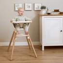 Gorgeous red headed boy sat in the white 6in1 High Chair in a farmhouse style white and oak kitchen | High chairs | Feeding & Weaning | Toddler Furniture - Clair de Lune UK