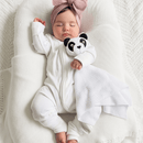 Newborn wearing the White Grow Grows Organic Ribbed Baby Sleepsuit and snuggling with the Panda Organic Comforter | Baby Sleep Wear | Children's pyjamas - Clair de Lune UK