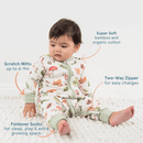 Toddler sat on the floor wearing the GrowGrows Organic Woodland Walks Sleepsuit | Baby Grows and Onesies | Organic Baby Clothes - Clair de Lune UK