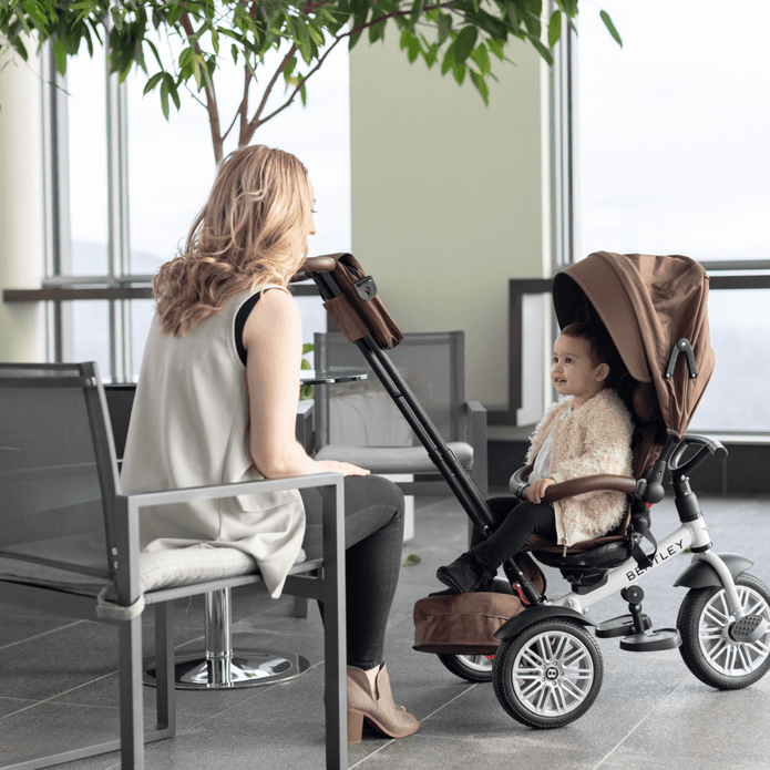 Mum talking to her daughter happily while her daughter is sitting on the Brown Bentley 6in1 Trike - Convertible Baby Stroller | Strollers, Pushchairs & Prams | Pushchairs, Carrycots & Car Seats Baby | Travel Essentials - Clair de Lune UK