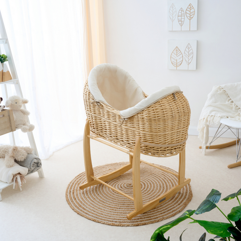 Cream organic natural noah pod on the natural deluxe rocking stand in a cream neutral nursery | Moses Basket Stand | Moses Baby Baskets & Bassinet Accessories | Nursery Furniture - Clair de Lune UK