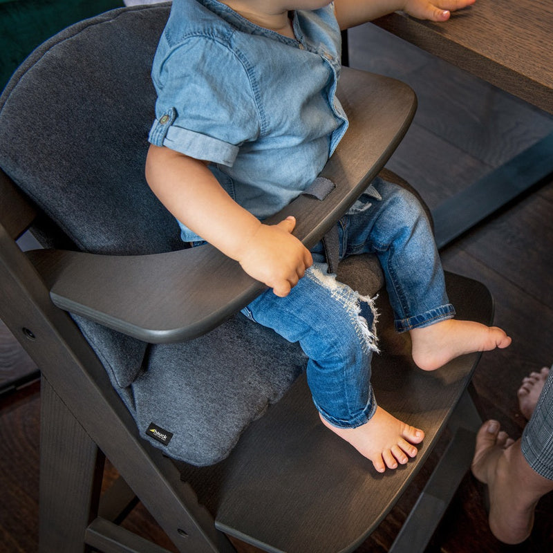 Baby sitting comfortably on the highchair from the Hauck Alpha+ Bouncer and High Chair Bundle | Highchairs | Feeding & Weaning - Clair de Lune UK