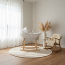 Waffle White Wicker Moses Basket With Stand & Bedding Bundle in a scandi minimalist beige nursery | Moses Baby Baskets & Bassinets | Nursery Furniture - Clair de Lune UK