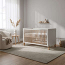 Essentials Cot Bed Bundle of Cot Bed, Mattress Protector, Mattress and Fitted Sheets in a light and airy Scandi-style nursery | Toddler Beds - Clair de Lune UK