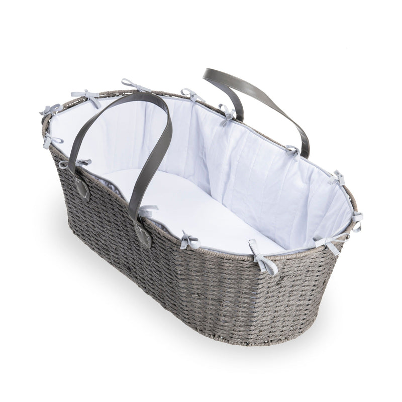 Clair de Lune Grey Sustainable Paper Moses Basket with two leather handles for mobility, white cosy dressing and firm fibre mattress with removable cover in the white background