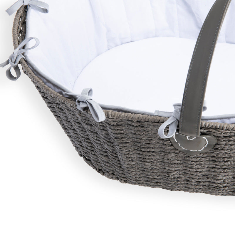 Clair de Lune Grey Sustainable Paper Moses Basket with two leather handles for mobility, white cosy dressing and firm fibre mattress with removable cover in the white background with the edge zoomed in