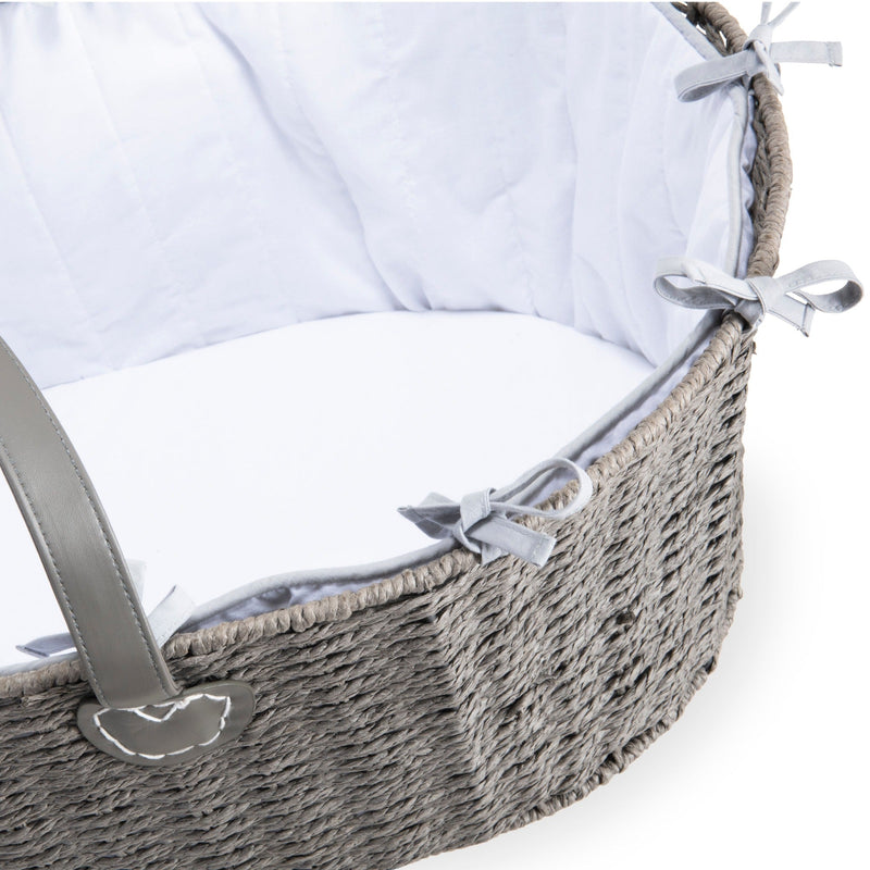 Clair de Lune Grey Sustainable Paper Moses Basket with two leather handles for mobility, white cosy dressing and firm fibre mattress with removable cover in the white background with the mattress and the bedding/ dressing zoomed in