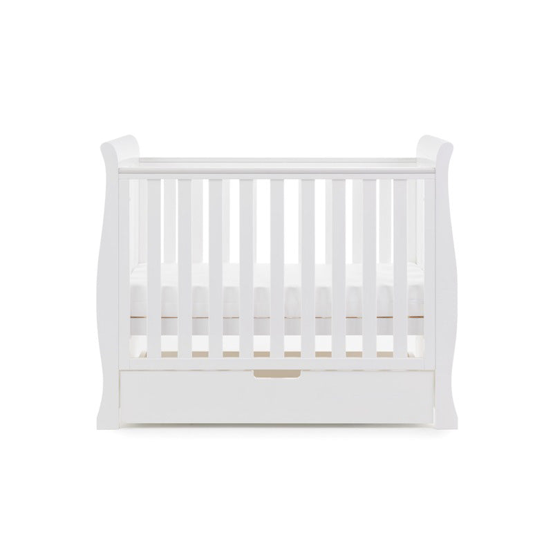 The white space-saving cot with mattress and a matching under drawer from the white Obaby Stamford Space Saver Cot & Changing Unit | Nursery Furniture Sets | Room Sets | Nursery Furniture - Clair de Lune UK